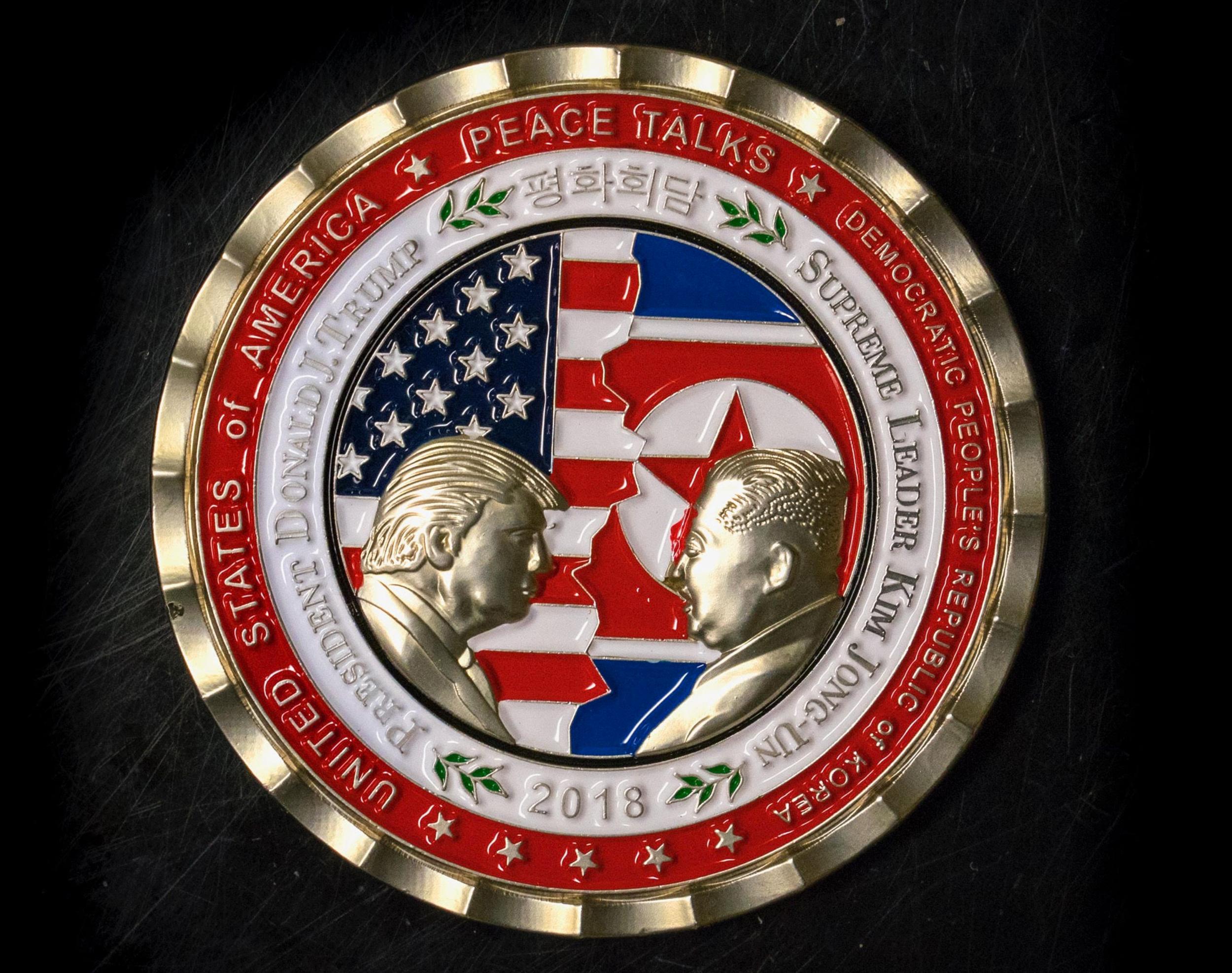 The coin describes the Asian leader as 'supreme leader', a term in common use though not an official title as such