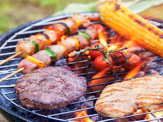 <p>Prearing meat and vegetables on a BBQ  </p>