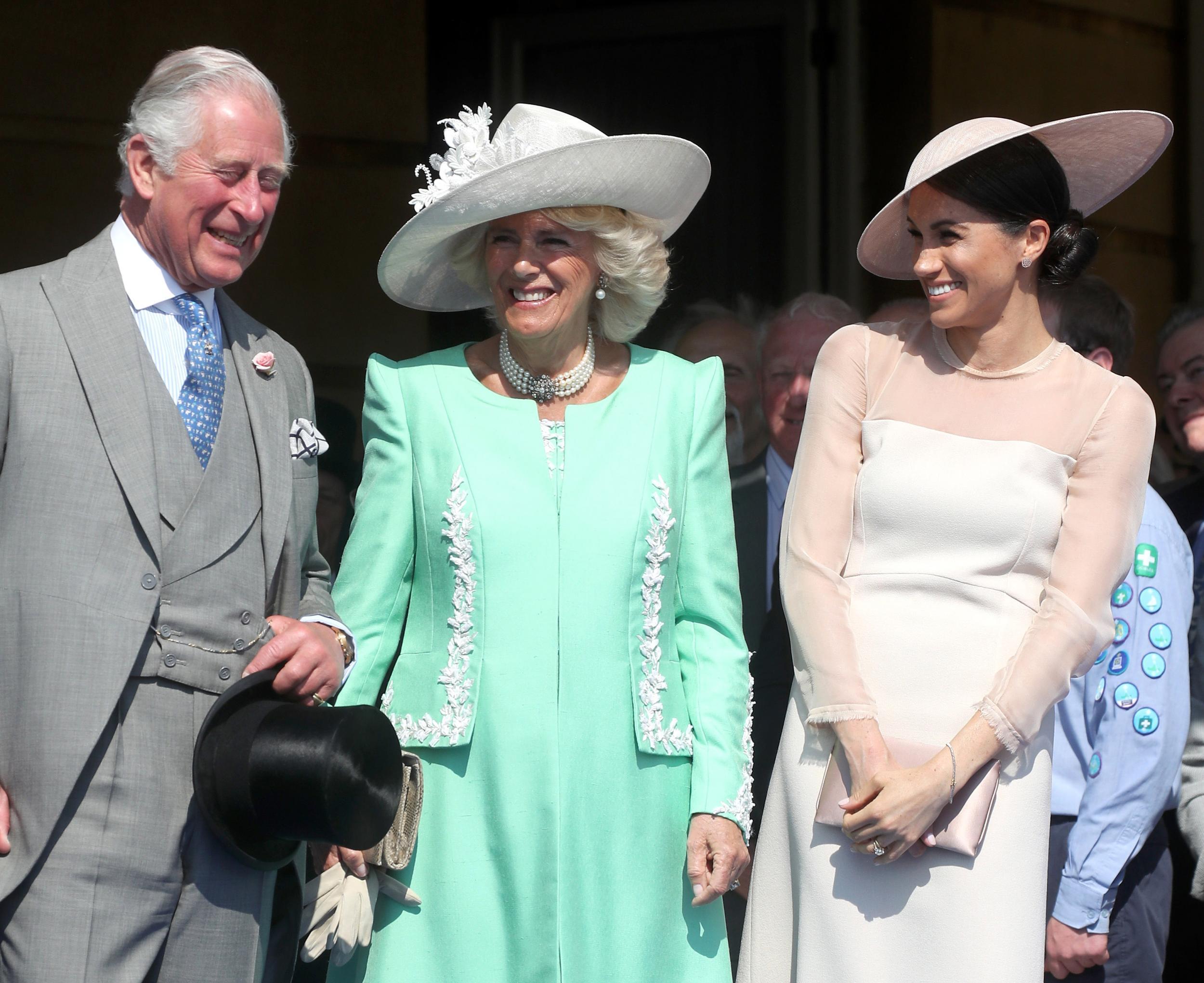 Meghan Markle laughed with Camilla and Prince Charles (Getty)