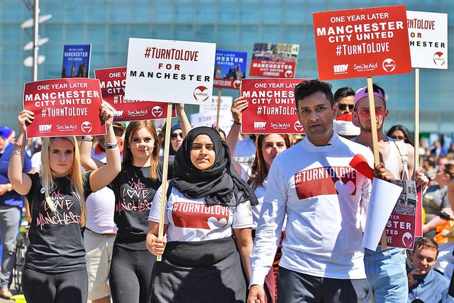 Manchester citizens marking the anniversary of the Manchester Arena attack