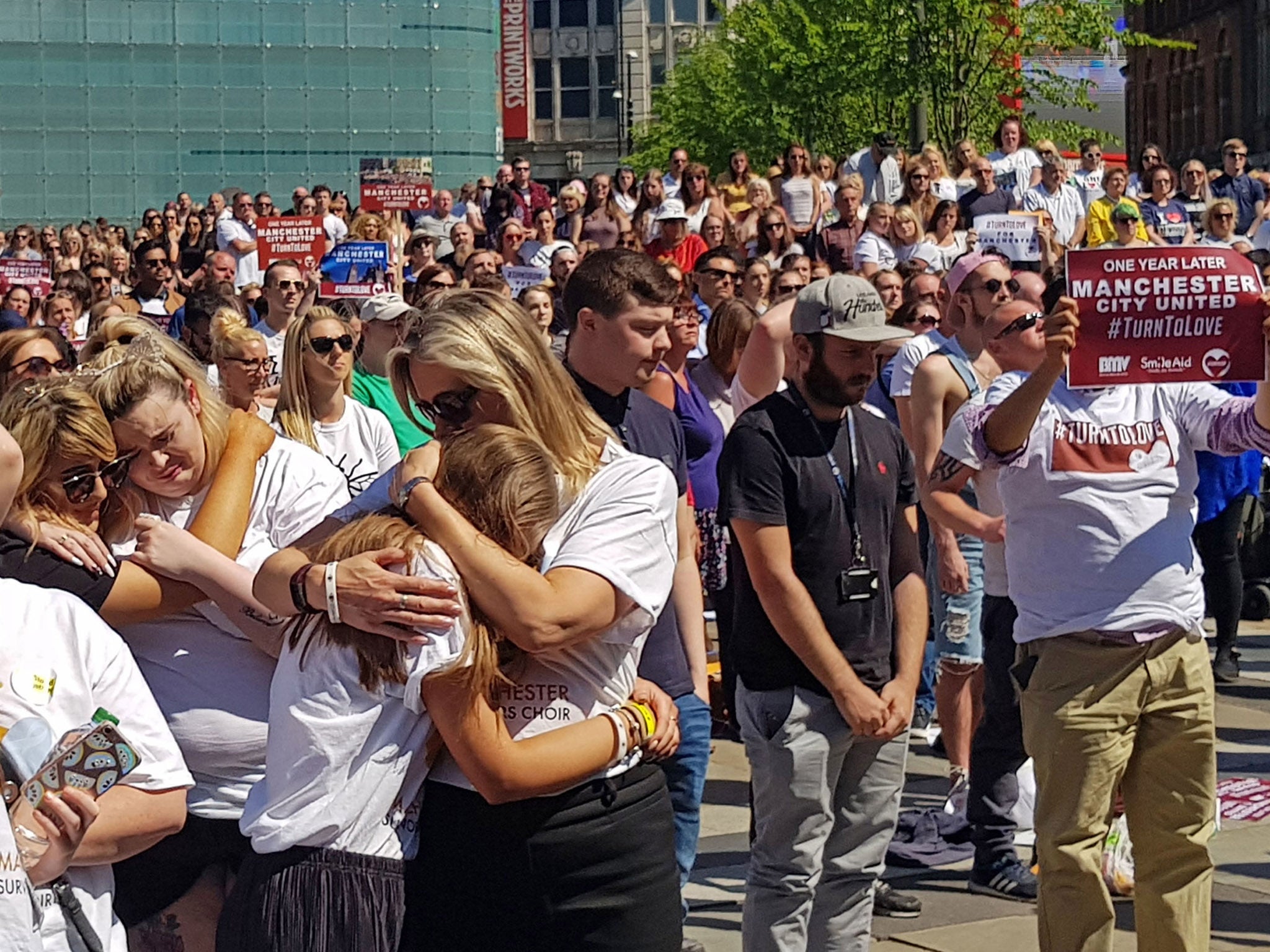 &apos;We are proud of our city&apos;: Thousands come together across Manchester to mark anniversary of bomb attack