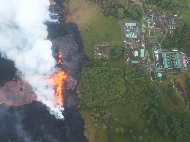 Lava flows from a Kilauea volcano fissure towrds the Puna Geothermal Venture plant