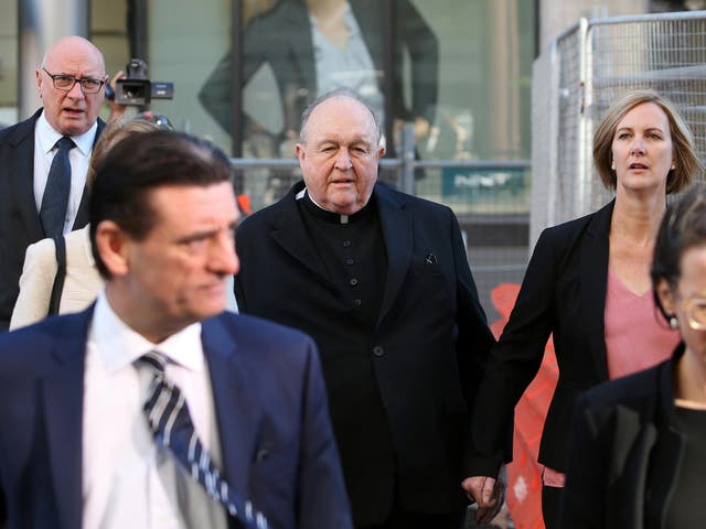 Archbishop Philip Wilson arrives at court in Newcastle, Australia on Tuesday