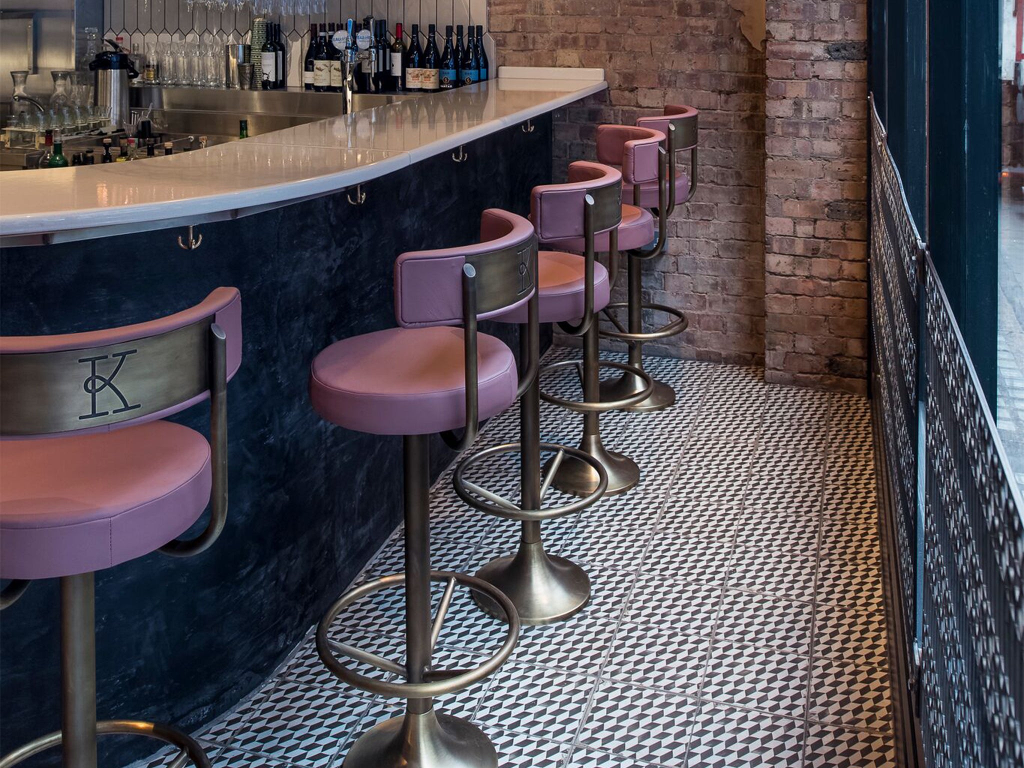 Pink leather custom bar stools inject fun at Kricket Soho