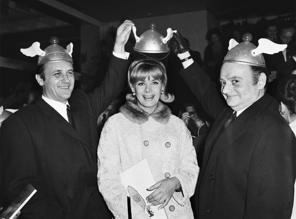 Rene Goscinny, Jacqueline Huet and Albert Uderzo at the premiere of the cartoon Asterix The Gaul At The Balzac Cinema In Paris, 1967