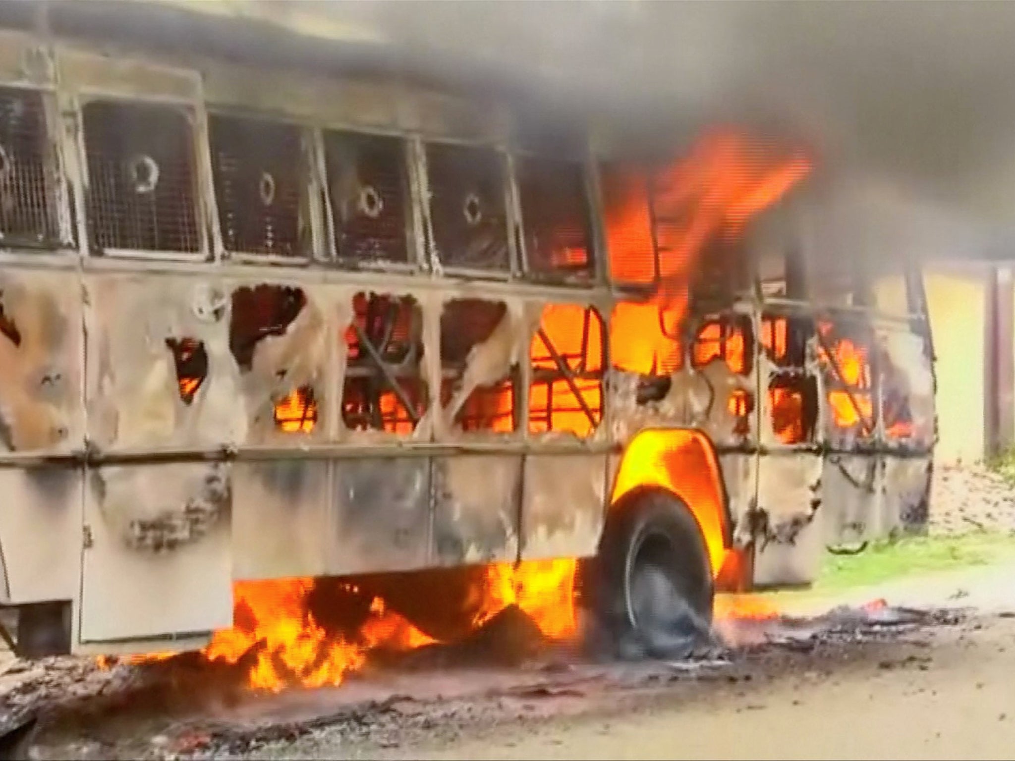 A bus on fire during a protest against the construction of a copper smelter by Vedanta Resources, in Thoothukudi