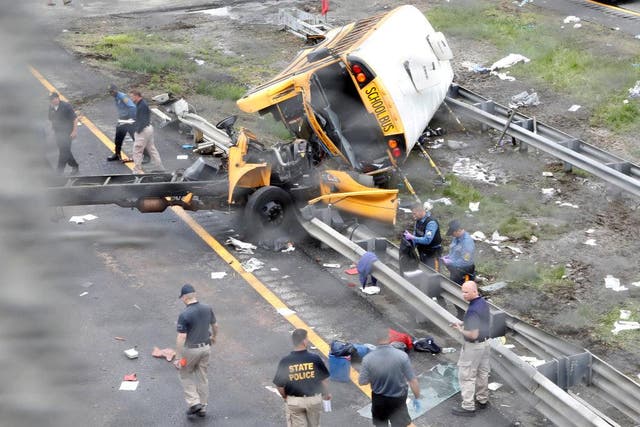 Police investigating the wreckage of a school bus after the crash in Mount Olive, New Jersey, last Thursday.