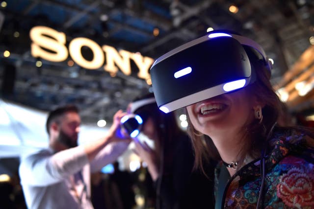 Attendee Kristen Sarah uses Sony's Playstation VR at the Sony booth during CES 2018 at the Las Vegas Convention Center on January 9, 2018 in Las Vegas, Nevada