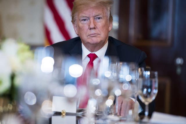 President Trump speaks during a dinner with governors to discuss border security and safe communities in the Blue Room at the White House on 21 May.