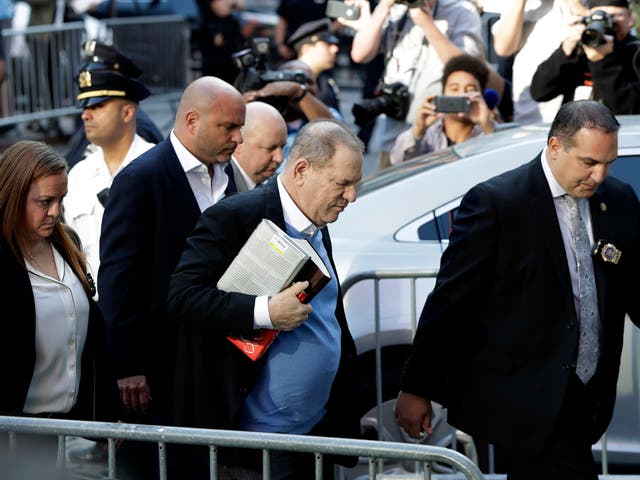 Harvey Weinstein arrives at the first precinct while turning himself to authorities following allegations of sexual misconduct