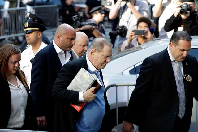 Harvey Weinstein arrives at the first precinct while turning himself to authorities following allegations of sexual misconduct
