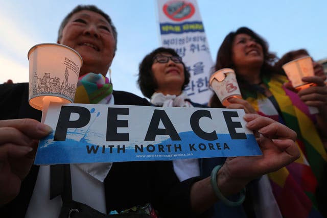 Protesters denounce the latest US move near the US embassy in Seoul on Friday