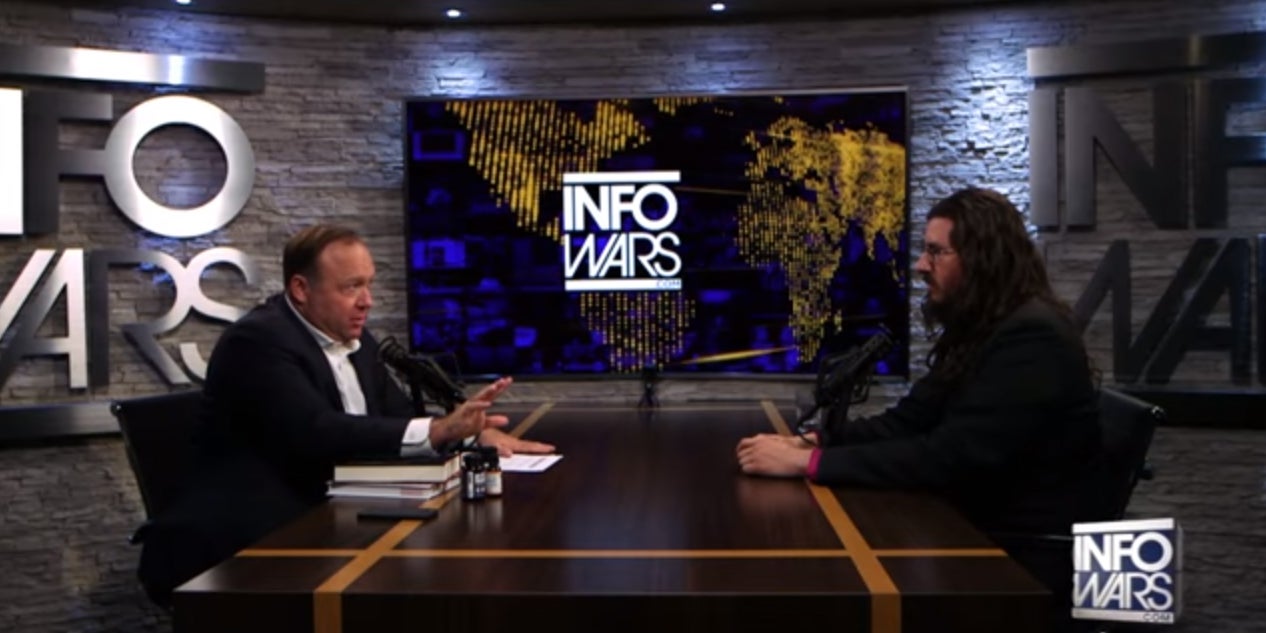 InfoWars host Alex Jones interviews a guest on his controversial show