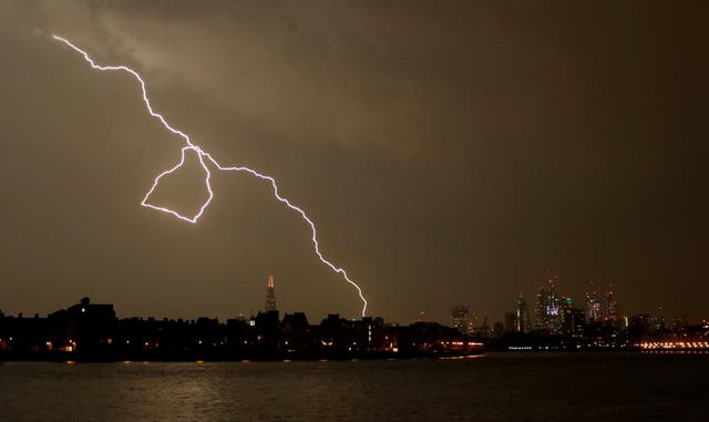 Lightning strikes over the city of London