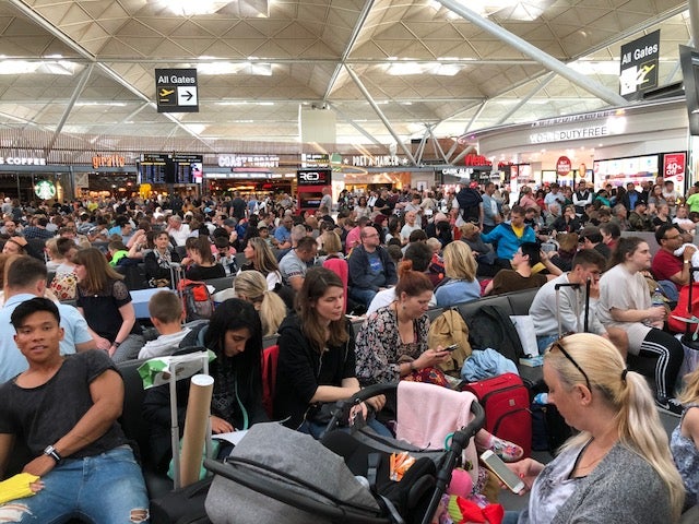 The scene in the departure lounge at Stansted after a fuel issue led to dozens of early flights being delayed or cancelled