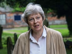 May faces government rift over Northern Ireland abortion ban