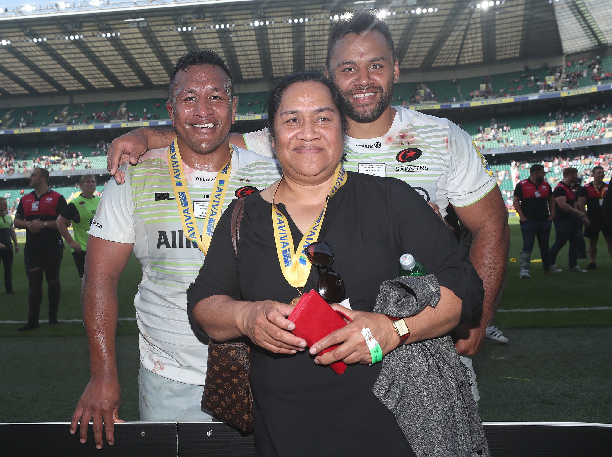 The Vunipola brothers pose for a family picture after the Premiership final