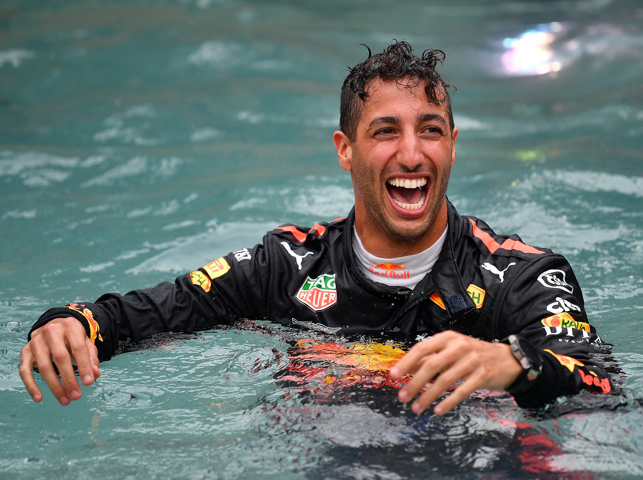 The Aussie took an impromptu dip to celebrates his Grand Prix win
