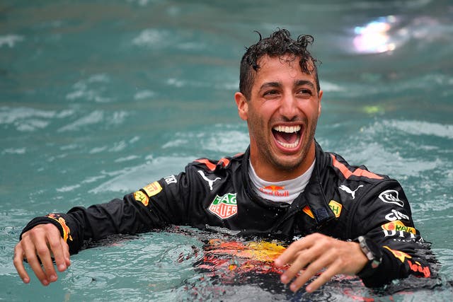 The Aussie took an impromptu dip to celebrates his Grand Prix win