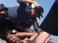 Police investigate after officer filmed punching woman in video