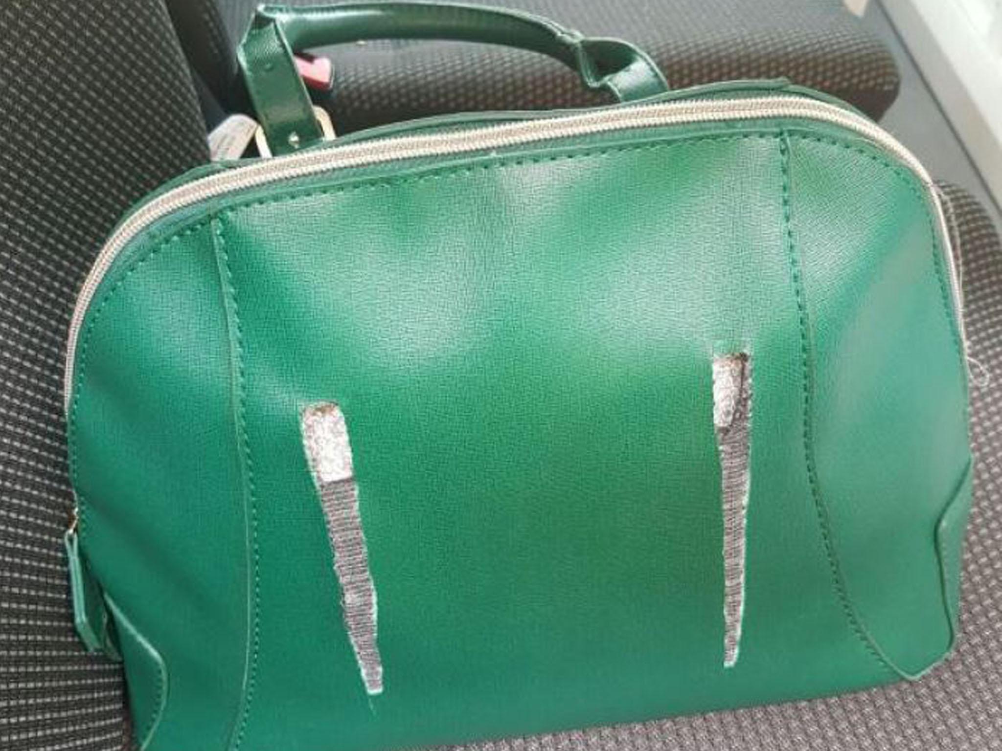 The muggers discarded the stolen green handbag after the attack