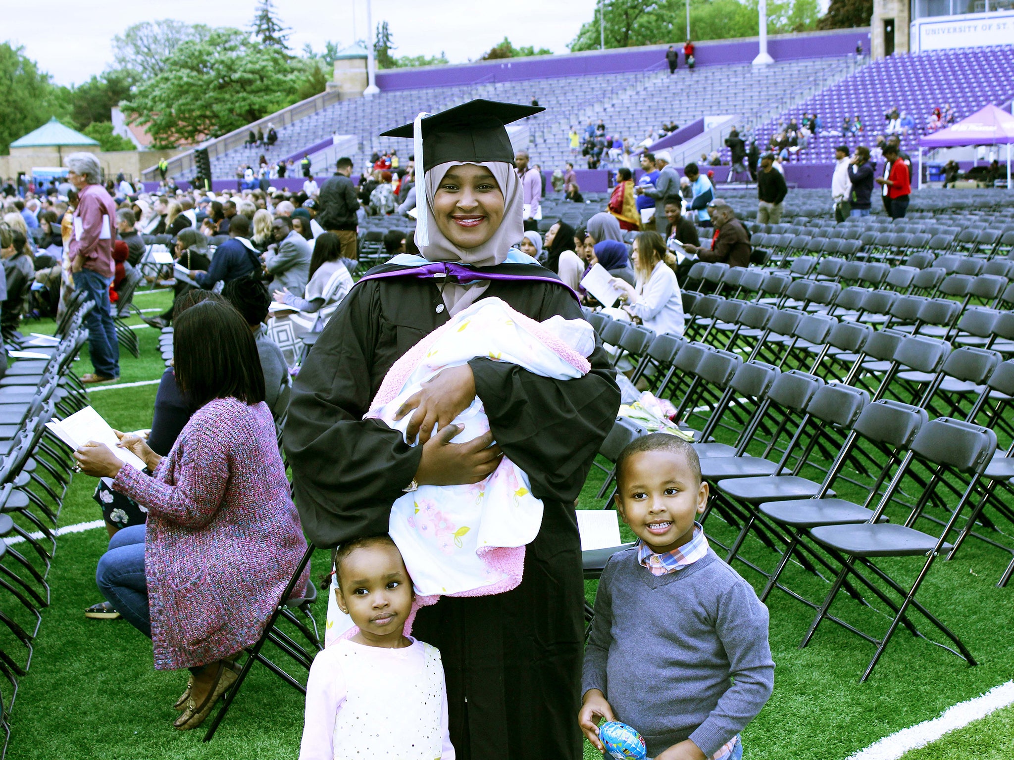 Zeinab Abdalla with her children on her graduation