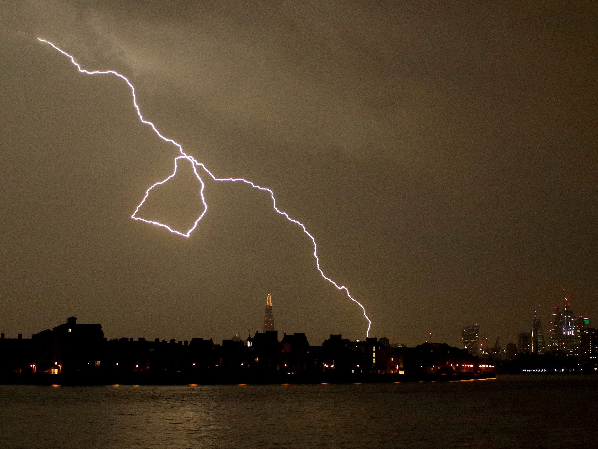 Lightning strikes over the city of London