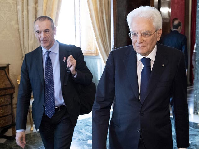 Italy's prime minister-designate, Carlo Cottarelli, meets with the country's president, Sergio Mattarella