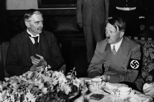 British prime minister Neville Chamberlain at dinner with Adolf Hitler during Chamberlain's 1938 appeasement visit to Munich