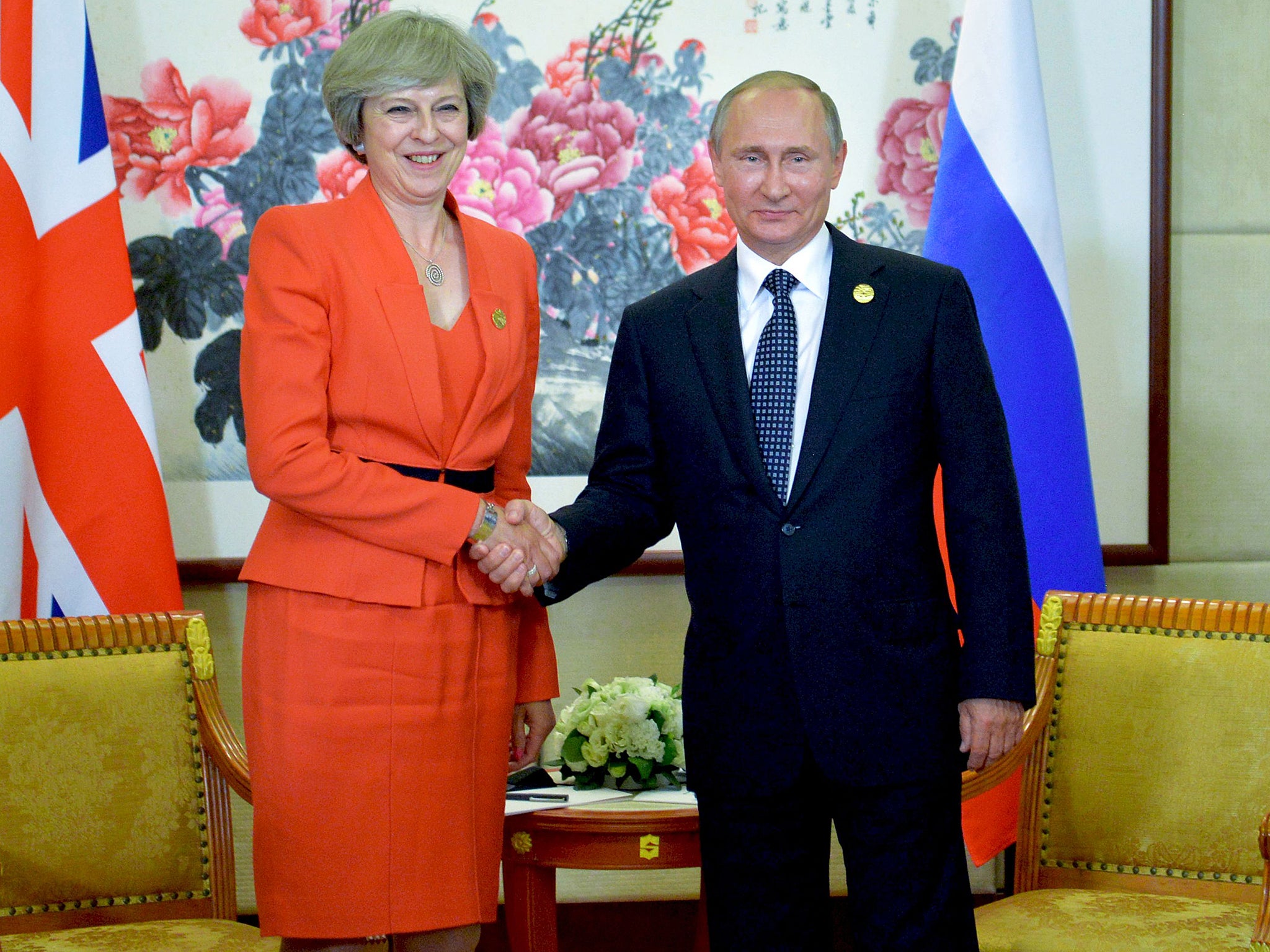 Mr Putin with Mrs May on the sidelines of the G20 Leaders Summit in Hangzhou on September 4, 2016