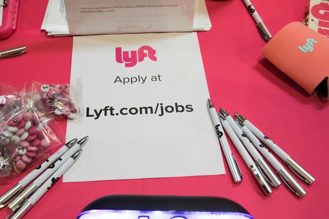 The Lyft booth is seen at job fair in Los Angeles, California