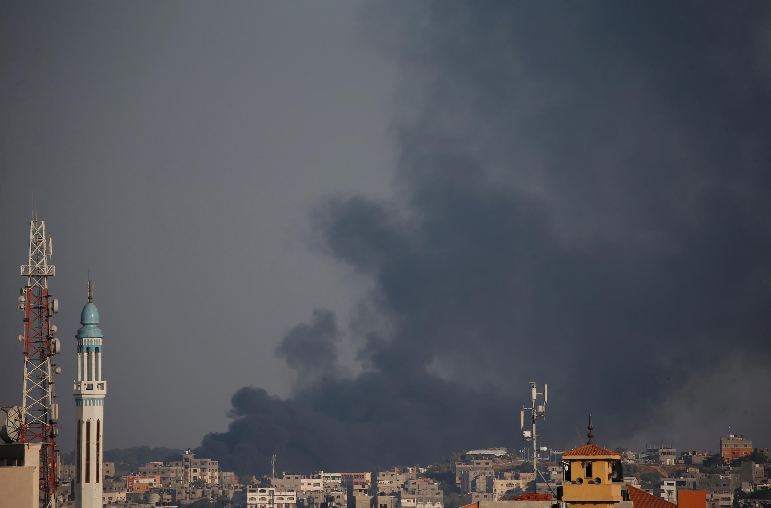 Black smoke is seen near the Israel-Gaza border, east of Gaza city on 29 May 2018