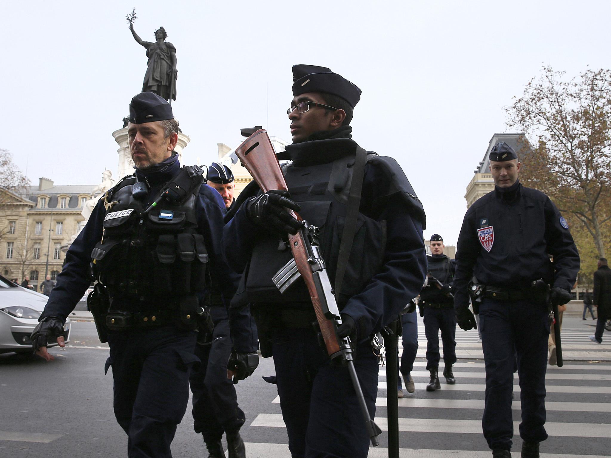 Police patrol in Paris?the morning after the series of deadly attacks in November 2015