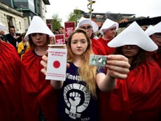 Protestors take illegal abortion pills in front of police in Belfast