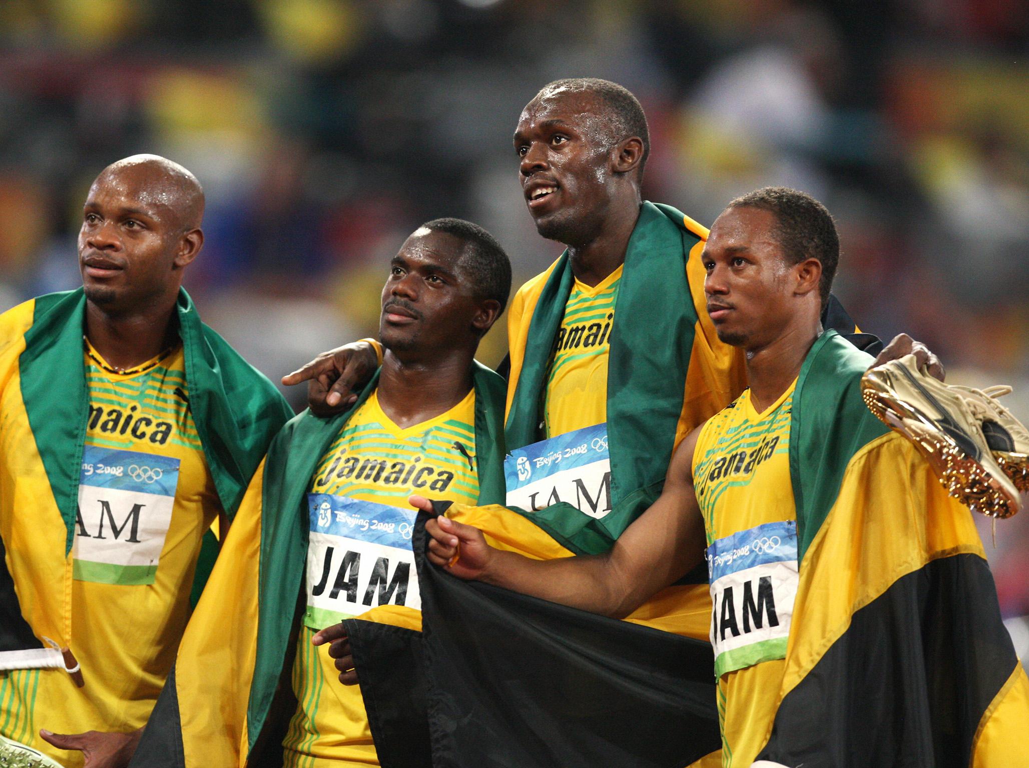 Nesta Carter, second left, was disqualified after re-examination
