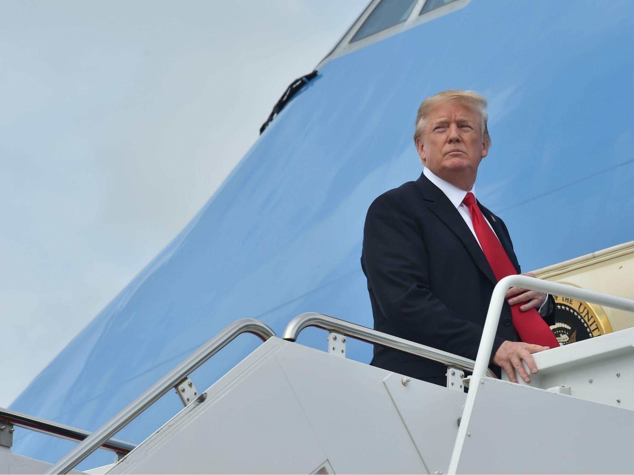 Mr Trump told reporters he is considering the pardon and commutation on board Air Force One