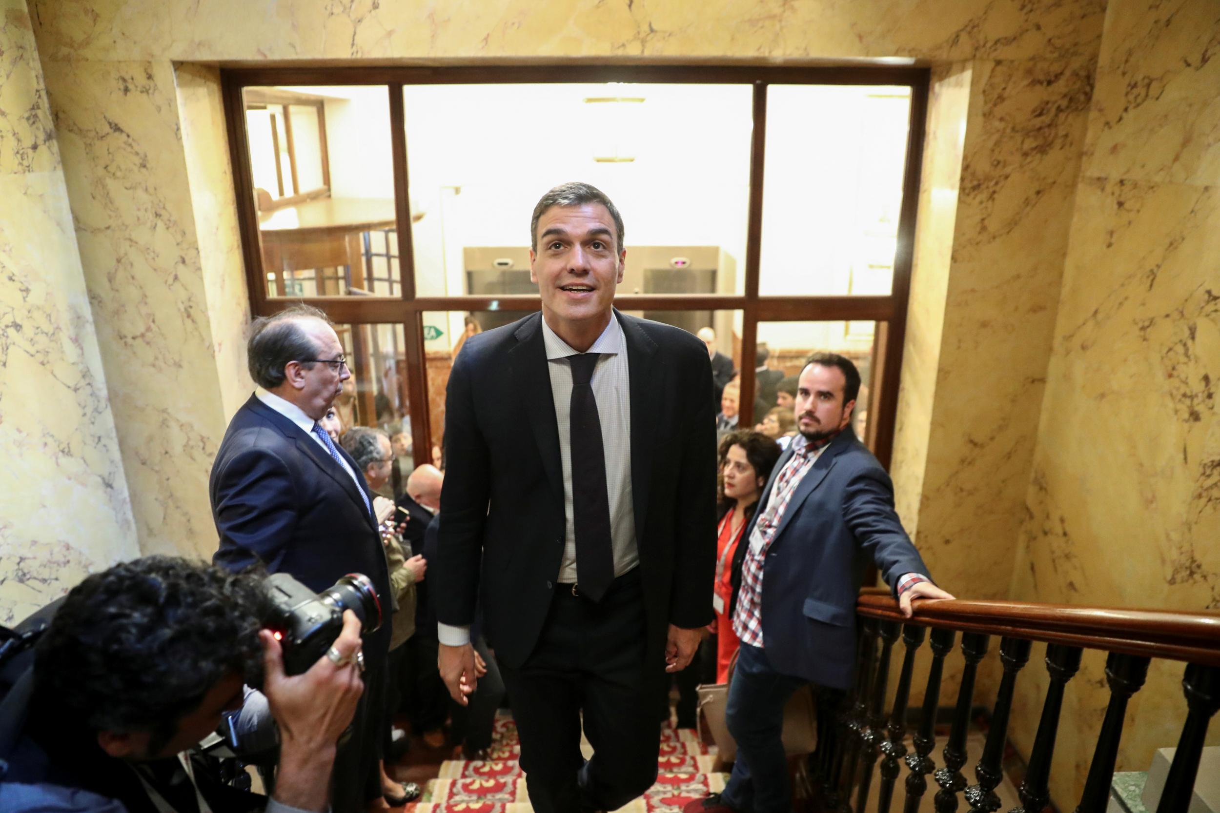 Spain’s new prime minister and Socialist party leader Pedro Sanchez leaves the chamber after a motion of no-confidence vote at parliament in Madrid on 1 June 2018 (Sergio Perez/Reuters)
