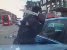 Cyclist launches road rage knife attack after car almost hits him