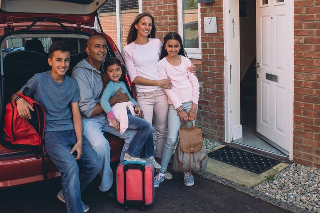 Family leaving home to go on holiday