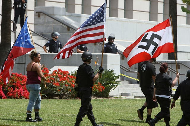 Members of the National Socialist Movement march in Los Angeles, California in 2010