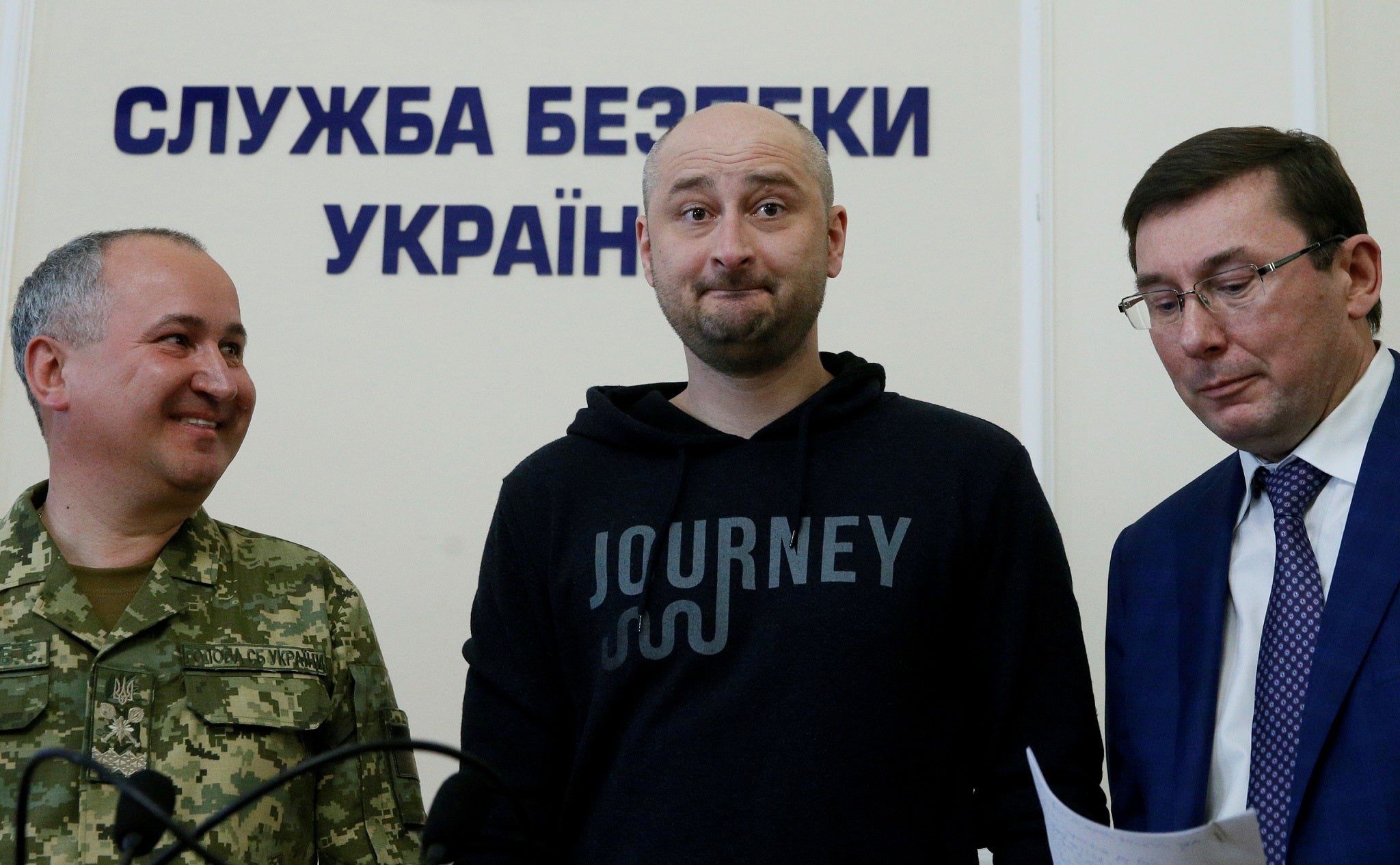 Russian journalist Arkady Babchenko (centre), who was reported murdered in the Ukrainian capital on May 29, Ukrainian Prosecutor General Yuriy Lutsenko (right) and head of the state security service Vasily Gritsak