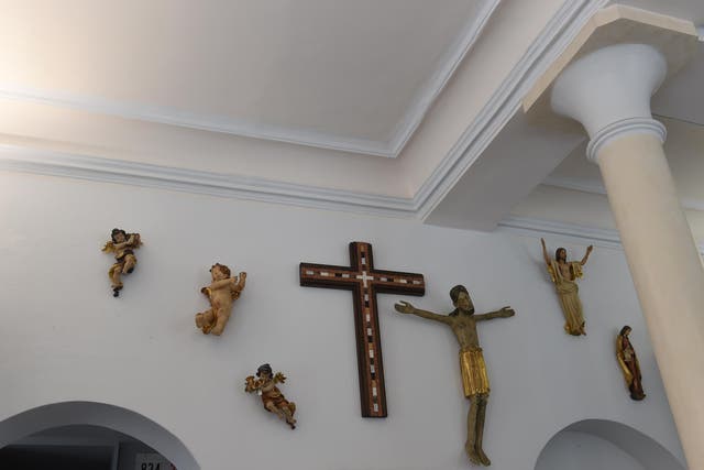 Crosses and other religious symbols in a shop in the Bavarian capital, Munich