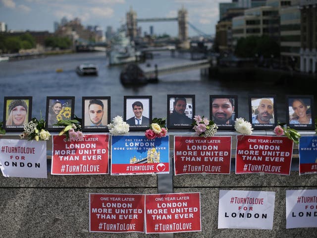 Photographs of the people killed in the London Bridge terror attack were left on the bridge ahead of a commemoration service