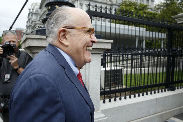 Rudy Giuliani said Mr Trump's legal team was 'leaning toward not' agreeing to an interview with special counsel Robert Mueller
