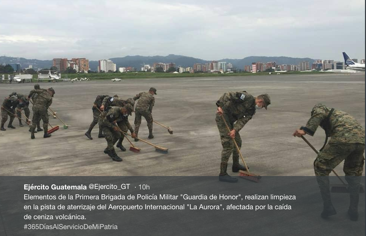 Clean sweep: members of the Guatemalan army clearing the apron at the capital’s airport