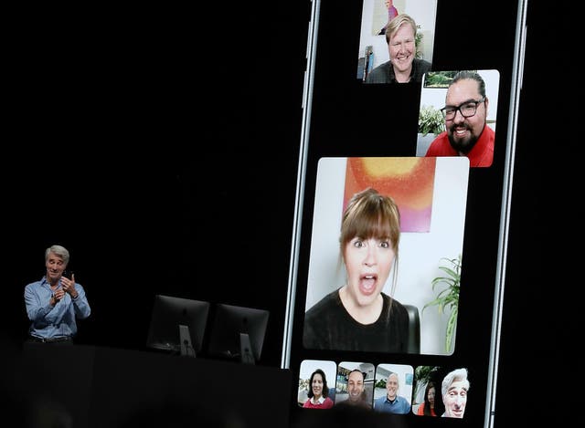 Apple's senior vice president of Software Engineering Craig Federighi demonstrates group FaceTime as he speaks during the 2018 Apple Worldwide Developer Conference