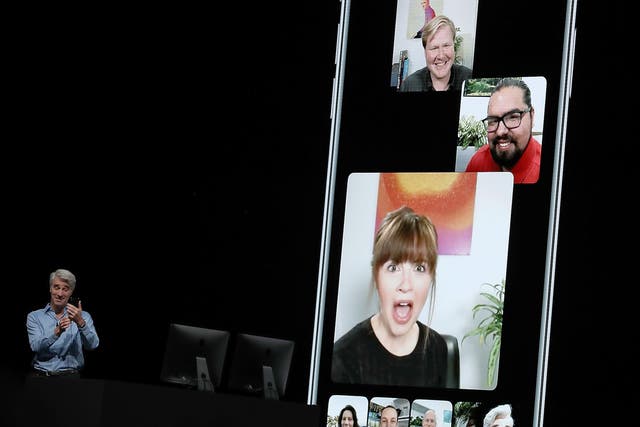 Apple's senior vice president of Software Engineering Craig Federighi demonstrates group FaceTime as he speaks during the 2018 Apple Worldwide Developer Conference