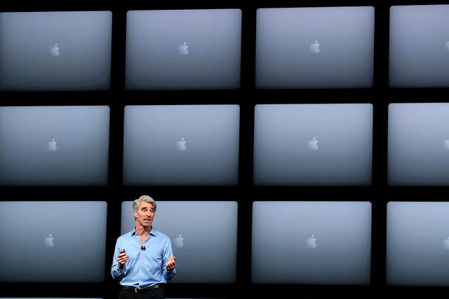 Apple's senior vice president of Software Engineering Craig Federighi speaks during the 2018 Apple Worldwide Developer Conference (WWDC) at the San Jose Convention Center on June 4, 2018