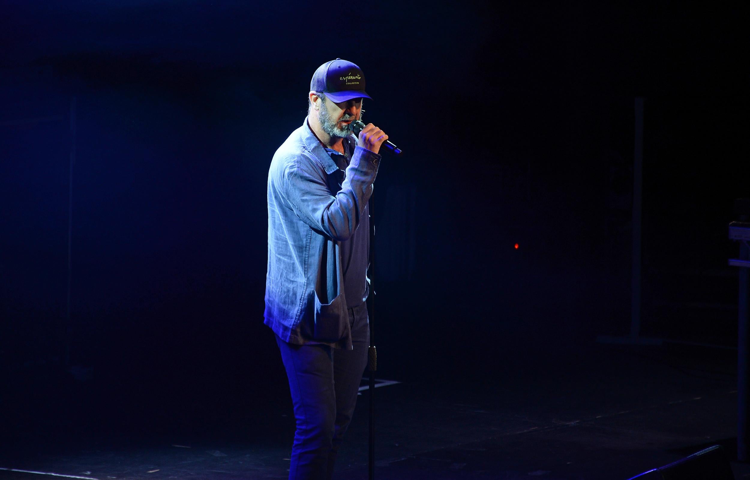 Eric Cantona reads a poem at Hoping For Palestine’s event at the Roundhouse in London