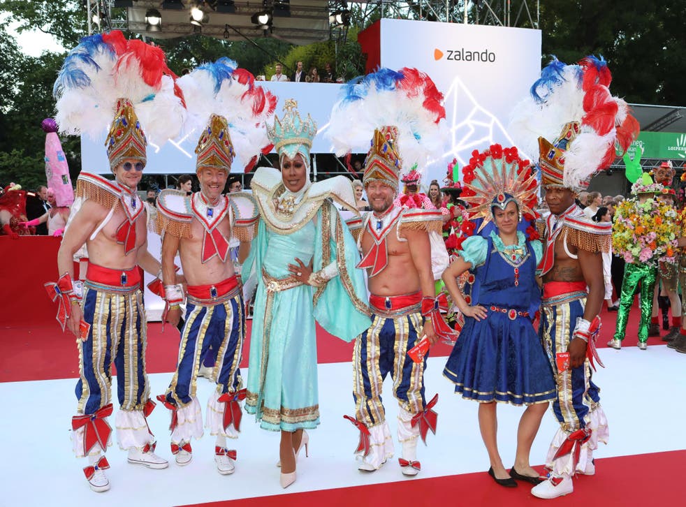 Drag performers pose on the red carpet at the Life Ball in Austria.